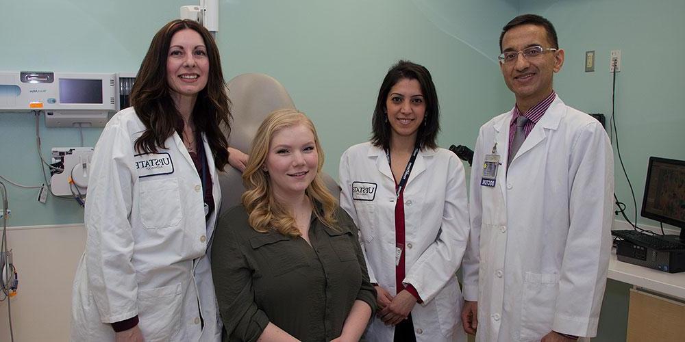 Pathology Lab Team Members with Patient