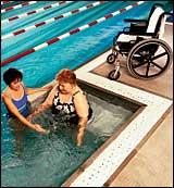 A WEALTH project participant with University Hospital Physical Therapist in the Institute's wheelchair-accessible, adjustable bottom pool. 