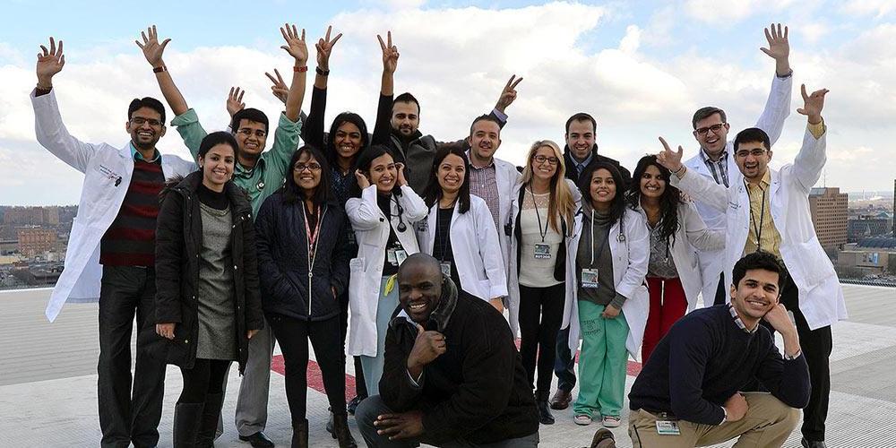 COM students on the helipad